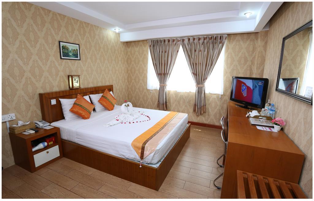 Hotel Kan Kaw Янгон Номер фото