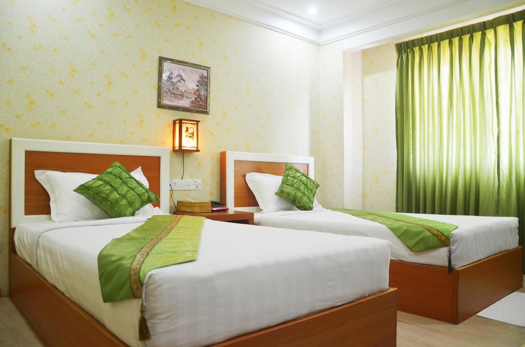 Hotel Kan Kaw Янгон Номер фото